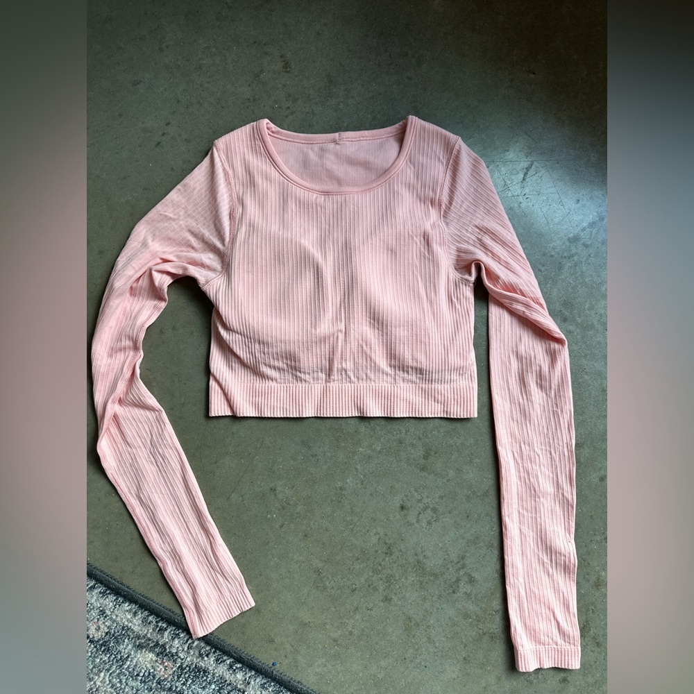 Lululemon ebb to street pink long sleeve cropped top size 4